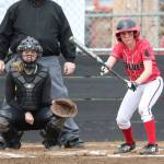 Coupeville&rsquo;s Jae LeVine shows bunt as Vashon Island catcher Hannah McArthur prepares to receive the pitch. (Photo by John Fisken)