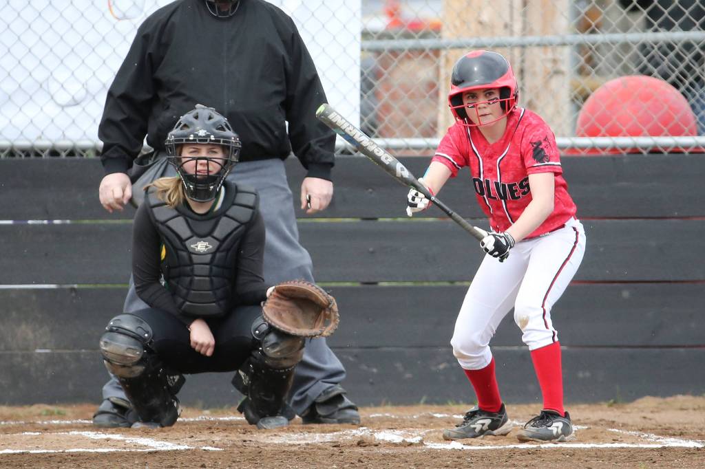 Coupeville&rsquo;s Jae LeVine shows bunt as Vashon Island catcher Hannah McArthur prepares to receive the pitch. (Photo by John Fisken)