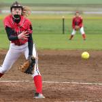 Wolves blow lead, rally for win / Softball