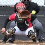 Late offensive rush carries Wolves to win / Softball
