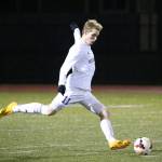 Andrew Franssen blasts a free kick for the Wildcats Tuesday. (Photo by John Fisken)