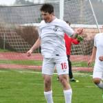 Teo Keilwitz heads the ball for the Wolves. (Photo by John Fisken)