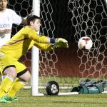 Oak Harbor&rsquo;s Austin Moncada rejects an Edmonds-Woodway shot Friday. (Pboto by John Fisken)