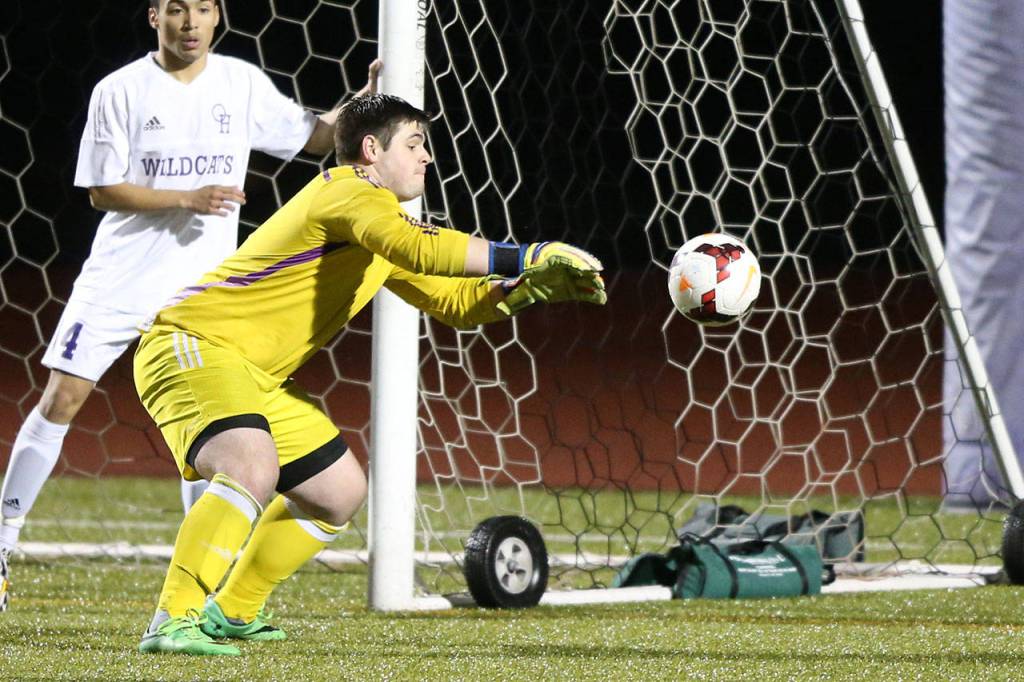 Oak Harbor&rsquo;s Austin Moncada rejects an Edmonds-Woodway shot Friday. (Pboto by John Fisken)