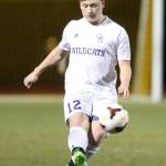 Chaz Purdy advances the ball for the Wildcats against Shorecrest. (Photo by John Fisken)