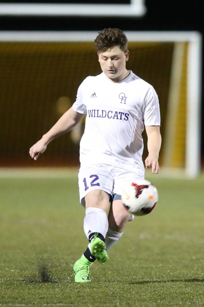 Chaz Purdy advances the ball for the Wildcats against Shorecrest. (Photo by John Fisken)