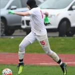 Ethan Spark dribbles up the field in Friday&rsquo;s match. (Photo by John Fisken)