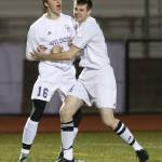 Kurtis Zylstra, left, and Jared Hoyt celebrate Zylstra&rsquo;s goal Tuesday night. (Photo by John Fisken)