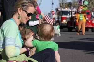 Coupeville&rsquo;s Lindsey Helm attends Oak Harbor&rsquo;s 2016 St. Patrick&rsquo;s Day with daughters Finley, center, and Scotlyn. Photo by Ron Newberry/Whidbey News-Times