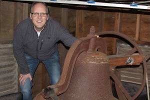Pastor David Parker gets his first upclose look at the original bell in the belfry at Oak Harbor First United Methodist Church Thursday, March 9, 2017. Parker and his congregation are preparing for Sunday&rsquo;s celebration of the church&rsquo;s 125th anniversary. The old bell, the same one used when the church opened in Crescent Harbor in 1891, will be rung 125 times Sunday. Photo by Ron Newberry/Whidbey News-Times