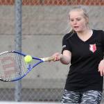 Fanny Deprelle volleys in second singles. (Photo by John Fisken)