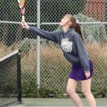 Alyssa Schneider smacks an overhead shot Wednesday. (Photo by John Fisken)