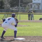 Trent Benson throws to Steven Richards in an attempt to pick off Everett&rsquo;s Michael Larson. (Photo by Jim Waller)