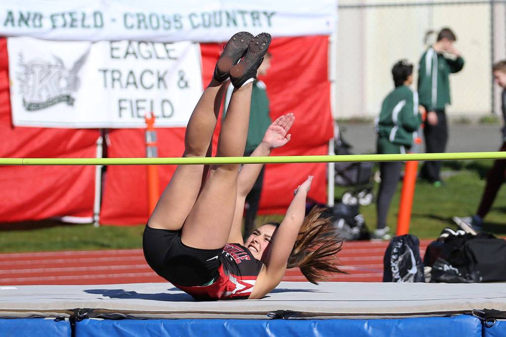 Lauren Bayne flies over the bar in the high jump. (Photo by John Fisken)