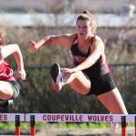 Lindsey Roberts glides over a hurdle Thursday. (Photo by John Fisken)