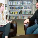 HomeConnection principal Shane Evans, left, interacts with freshman Michelle Consolver in the lounge area of the school&rsquo;s library. Due to the program at HomeConnection, Consolver aspires to earn enough credits to begin the Running Start program early. Photo by Daniel Warn/Whidbey News-Times