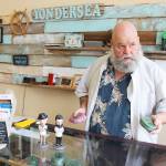 Kevin Bell uses and sells Reuzel, a pomade made for men in Holland, at his Yondersea barber shops.                                Photos by Patricia Guthrie/Whidbey News-Times