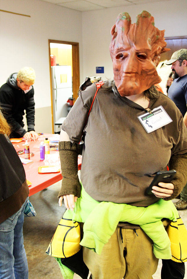 An Oak Harbor resident came to the city&rsquo;s first comicon saturday at Oak Harbor Library as Groot from &ldquo;Gaurdians of the Galaxy.&rdquo; True to the character&rsquo;s roots, all she would say was, &ldquo;I am Groot.&rdquo; Photo by Daniel Warn/Whidbey News-Times