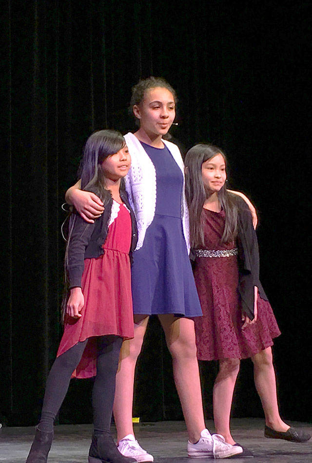 The Three Musketeers, Johnna Ordonio, Jasmine Phillips and Katie Tabar, respectively perform Sunday at Oak Harbor High School in Whidbey Has Talent. Photo by Daniel Warn/Whidbey News-Times