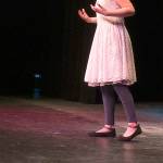 Valerie Burdt sings as part of the persentation division of Whidbey Has Talent Sunday at Oak Harbor High School. Photo by Daniel Warn/Whidbey News-Times