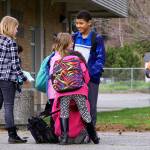 Coupeville Elementary School children wait to depart school grounds on March 31, 2017. The Coupeville School District is exploring options as it looks at long-range planning for the aging elementary school. One option is to build a new school away from the busy highway. Photo by Ron Newberry/Whidbey News-Times