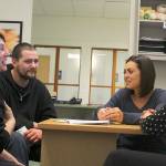 Carla Farnell and Shawn Lowe meet with Island County Housing Support Center staff Malissa Taylor and Joanne Pelant to discuss an assistance voucher. Living out of their car all winter, the homeless couple may soon be moving into an Oak Harbor apartment. Farnell lost her motel housekeeping job after five days of work when the employer discovered she was homeless and had given a fake address on her application. The windshield of their car was bashed in one day when they were away bathing in a creek. They then recived a traffic ticket for driving with a broken windshield. Photo by Patricia Guthrie/Whidbey News-Times