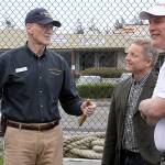 Wil Shellenberger, left, president of the PBY Memorial Foundation, speaks with on-air personalities Jim Dever of KING 5&rsquo;s Evening Magazine and Mark Christopher during a tour of the PBY-Naval Air Museum in Oak Harbor Thursday, April 6. Christopher, whose father was a PBY pilot during World War II, will emcee the museum&rsquo;s Celebration of Flight Dinner and Auction Saturday, May 20 at the Oak Harbor Elks Lodge. Dever will serve as the auctioneer. Photo by Ron Newberry/Whidbey News-Times