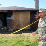 Photo by Jessie Stensland / Whidbey News-Times                                Michael Marcelino, a Navy logistics specialist with VP-1, speaks about his response to a fire in Oak Harbor Tuesday night that killed a man and injured a woman.
