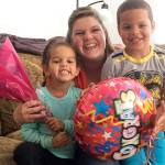 Melissa Brown and her two children celebrate moving into their Habitat for Humanity house on Dec. 28, 2015. Photo provided by Habitat for Humanity of Island County