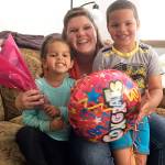 Melissa Brown and her two children celebrate moving into their Oak Harbor Habitat for Humanity house. Photo provided by Habitat for Humanity of Island County