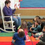 First grade teacher Amy Watson reads to a group of students at Crescent Harbor Elementary, just the tip of the iceberge for student reading at the school. Photo provided.