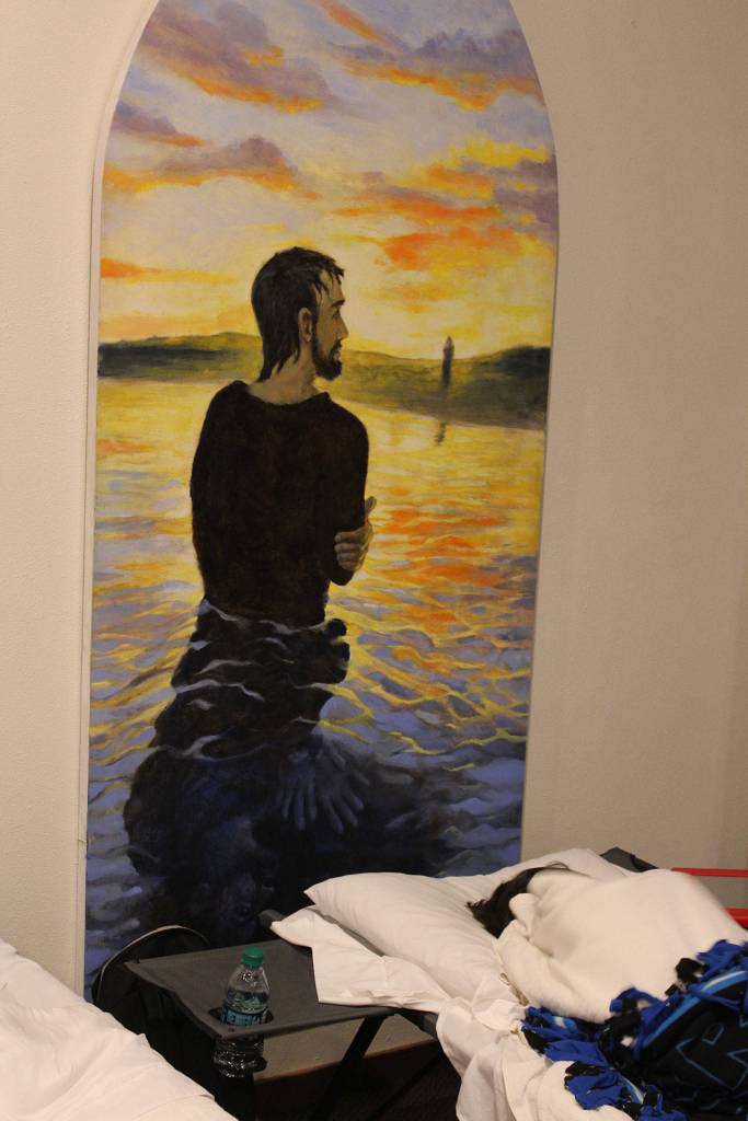 A little boy goes to sleep clutching a red Etch A Sketch board given to him earlier in the day.                                Photo by Patricia Guthrie/Whidbey News-Times