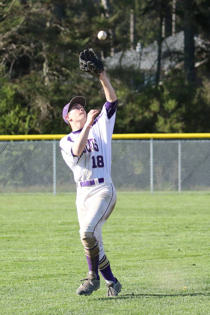 Trent Benson runs down a pop-up. (Photo by John Fisken)