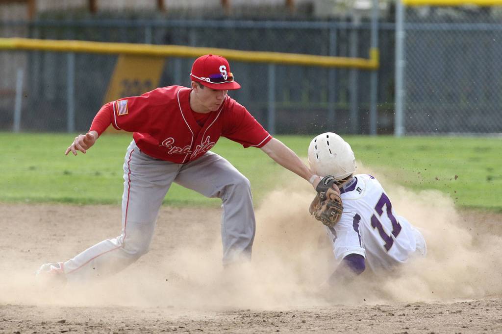 James Besaw steals second base ahead of the tag of Marysville-Pilchuck&rsquo;s Daniel Evoy. (Photo by John Fisken)