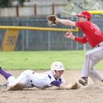 James Besaw dives back into secondbase on an attempted pick off as Daniel Evoy takes the throw. (Photo by John Fisken)