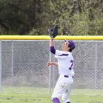 Rightfielder Caleb Fitzgerald runs down a flyball. (Photo by John Fisken)