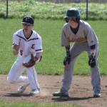 Shortstop Matt Hilborn, left, keeps a Friday Harbor runner close at second. (Photo by Jim Waller/Whidbey News-Times)