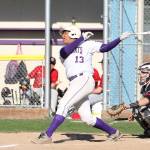 Kamren Mebane slaps a double for the Wildcats. (Photo by John Fisken)