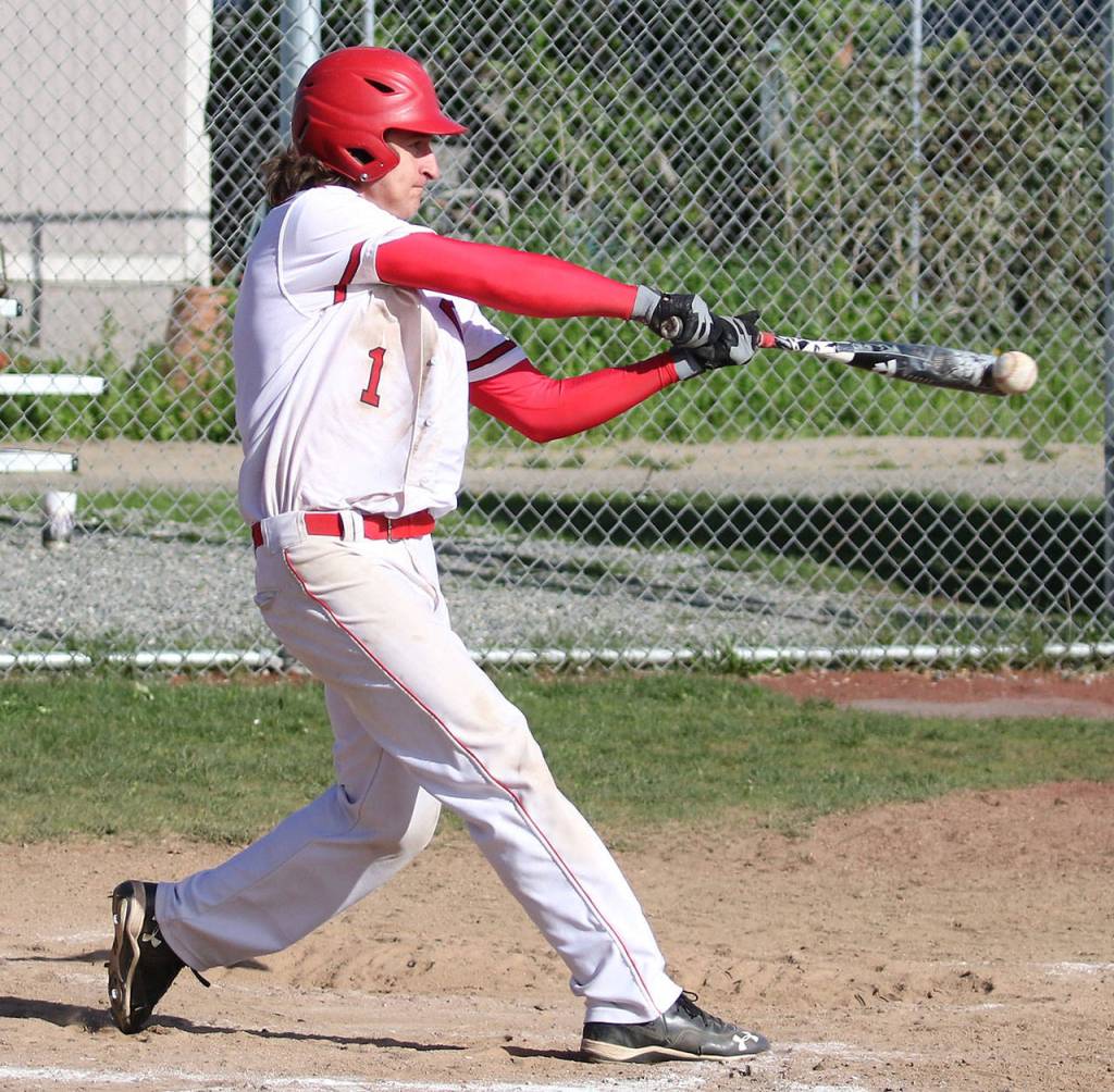 Clay Reilly squares up a ball for one of his three base hits Wednesday. (Photo by John Fisken)