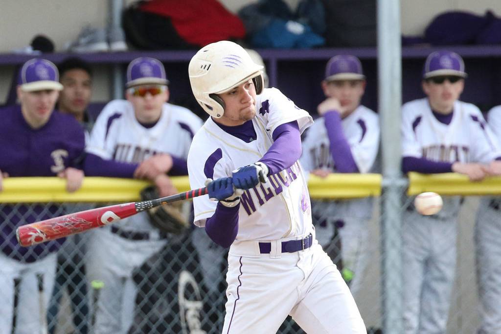 Steven Richards attacks a pitch for the Wildcats. (Photo by John Fisken)