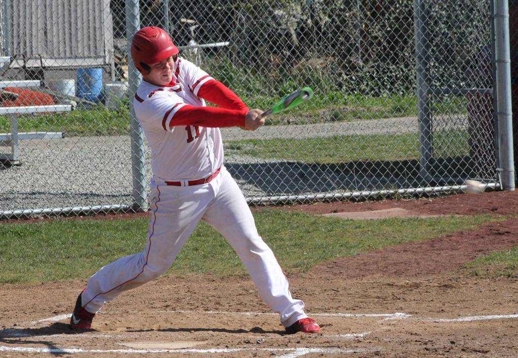 Julian Welling grounds out to shortstop, driving in a run. (Photo by Jim Waller/Whidbey News-Times)