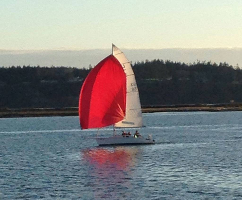 Slingshot sails at sunset. (Photo by Byron Skubi)