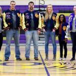 Six Jansen children show off their letter jackets at the Oak Harbor High School gymnasium. Jessica, left, Jon, Jake, Jennie, Jember and Julie combined to earn 48 varsitiy letters. (Photo by Emma Wezeman)