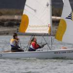 Jordan Wood-Pina, left, and Piper Fisher get ready to sail. (Photo by John Fisken)