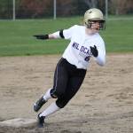 Oak Harbor&rsquo;s Brooke Gilham rounds third on the way to scoring a run for the Wildcats. (Photo by John Fisken)