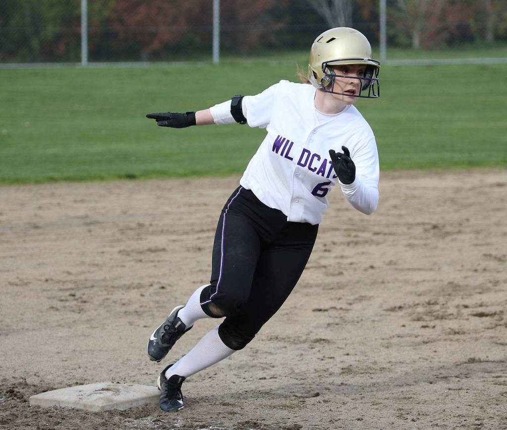 Oak Harbor&rsquo;s Brooke Gilham rounds third on the way to scoring a run for the Wildcats. (Photo by John Fisken)