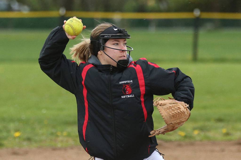 Lauren Rose tosses to first in the LC game. (Photo by John Fisken)