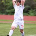 Teo Keilwitz puts the ball in play in the match with Klahowya. (Photo by John Fisken)