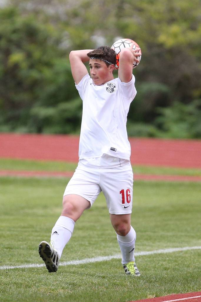 Teo Keilwitz puts the ball in play in the match with Klahowya. (Photo by John Fisken)