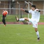 Aram Leyva reaches to knock down the ball in Saturday&rsquo;s match. (Photo by John Fisken)